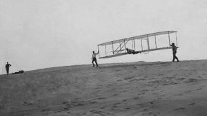 Th Wright Brothers flying their plane